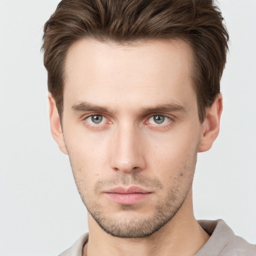 Neutral white young-adult male with short  brown hair and brown eyes