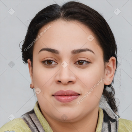 Joyful latino young-adult female with medium  brown hair and brown eyes