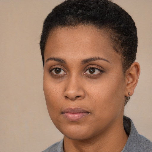 Neutral black young-adult female with short  brown hair and brown eyes