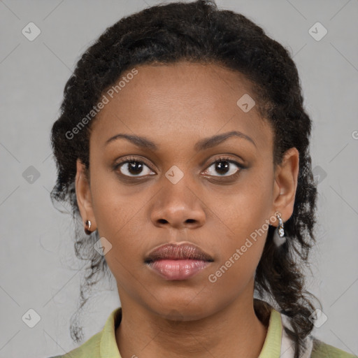 Neutral black young-adult female with medium  brown hair and brown eyes