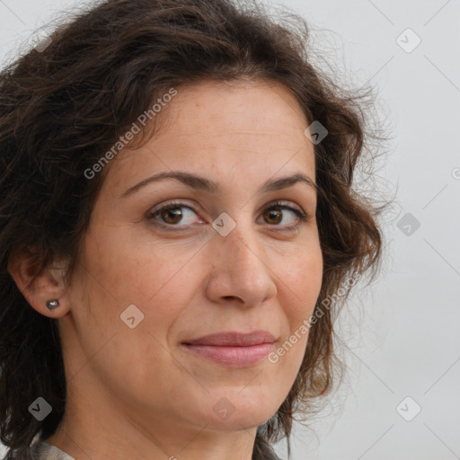 Joyful white adult female with long  brown hair and brown eyes