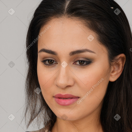 Joyful latino young-adult female with long  brown hair and brown eyes