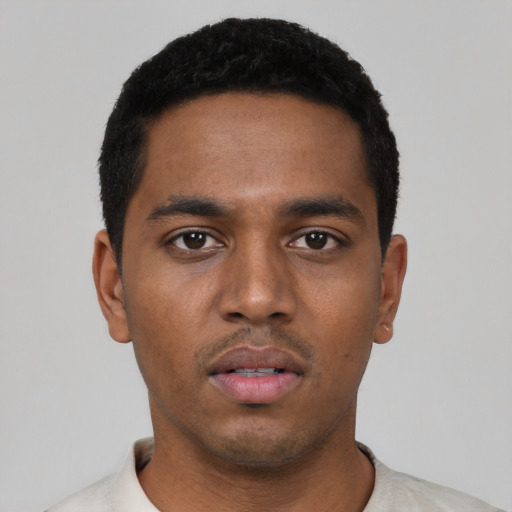 Neutral black young-adult male with short  black hair and brown eyes