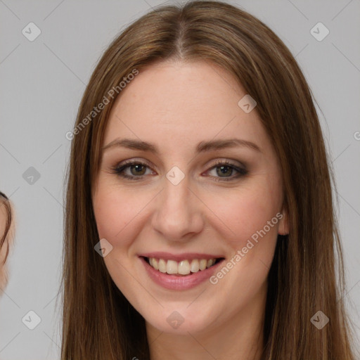 Joyful white young-adult female with long  brown hair and brown eyes