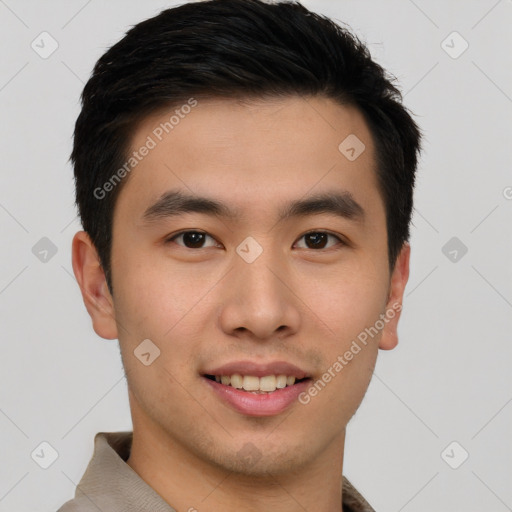 Joyful asian young-adult male with short  brown hair and brown eyes