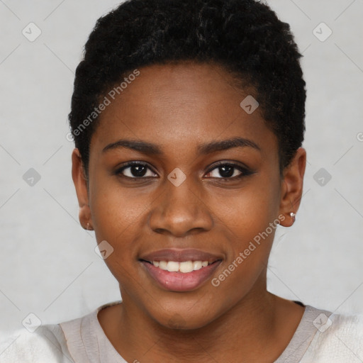 Joyful black young-adult female with short  black hair and brown eyes