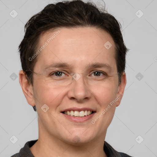 Joyful white adult male with short  brown hair and grey eyes