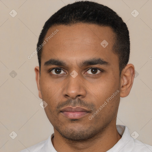 Neutral latino young-adult male with short  black hair and brown eyes