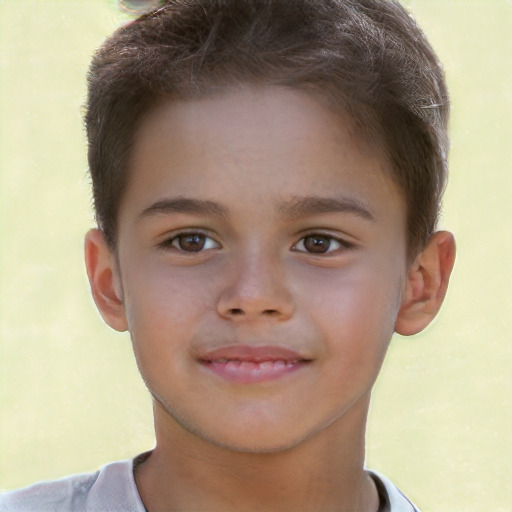 Joyful white child male with short  brown hair and brown eyes