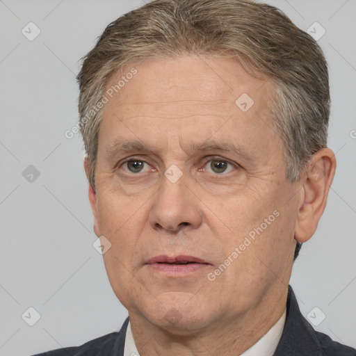 Joyful white middle-aged male with short  brown hair and brown eyes