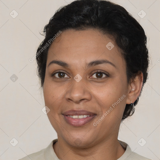 Joyful latino young-adult female with short  brown hair and brown eyes