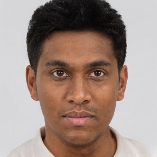 Neutral black young-adult male with short  brown hair and brown eyes