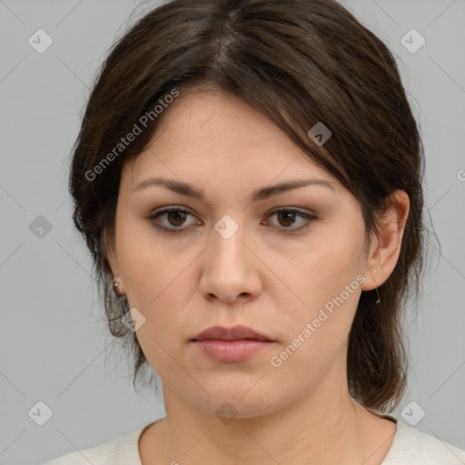 Neutral white young-adult female with medium  brown hair and brown eyes