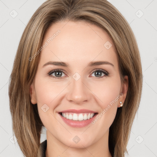 Joyful white young-adult female with medium  brown hair and green eyes