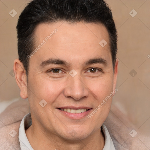 Joyful white adult male with short  brown hair and brown eyes