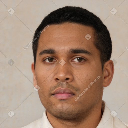 Neutral latino young-adult male with short  black hair and brown eyes