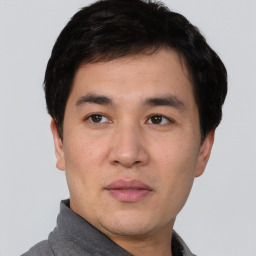 Neutral asian young-adult male with short  brown hair and brown eyes