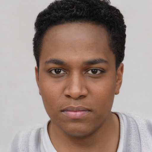 Neutral black young-adult male with short  brown hair and brown eyes