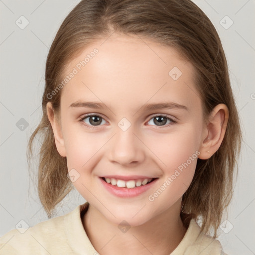 Joyful white child female with medium  brown hair and brown eyes