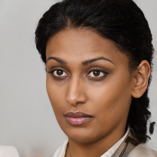 Neutral asian young-adult female with medium  brown hair and brown eyes