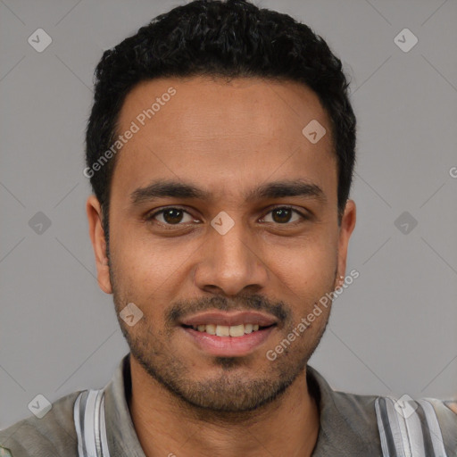 Joyful white young-adult male with short  black hair and brown eyes