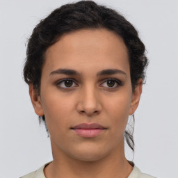 Neutral white young-adult female with short  brown hair and brown eyes