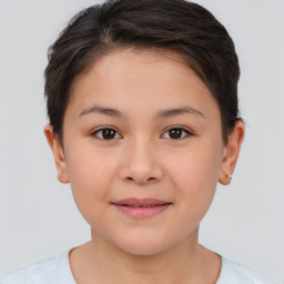 Joyful white child female with short  brown hair and brown eyes