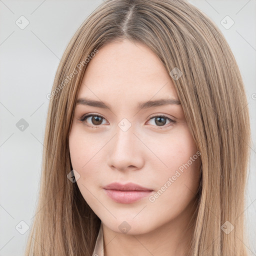 Neutral white young-adult female with long  brown hair and brown eyes