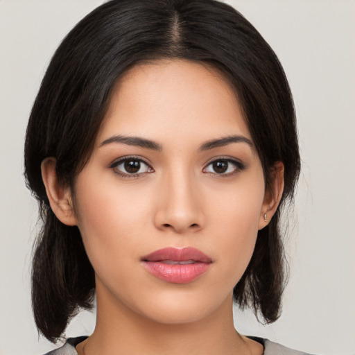 Neutral asian young-adult female with medium  black hair and brown eyes