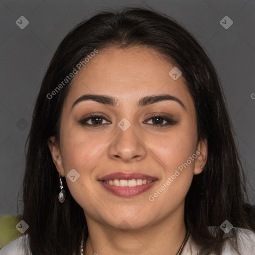 Joyful white young-adult female with long  brown hair and brown eyes