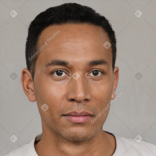 Neutral latino young-adult male with short  black hair and brown eyes