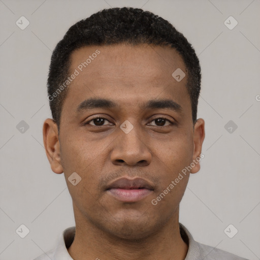 Neutral latino young-adult male with short  black hair and brown eyes