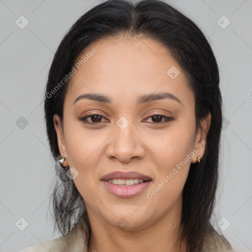 Joyful latino young-adult female with medium  brown hair and brown eyes