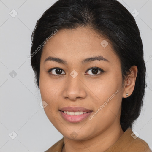 Joyful asian young-adult female with medium  brown hair and brown eyes