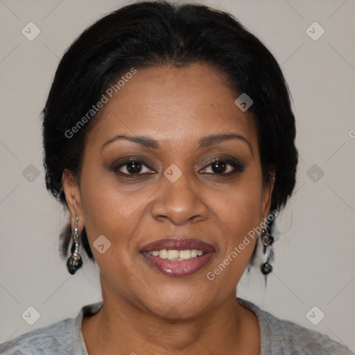 Joyful black adult female with medium  brown hair and brown eyes