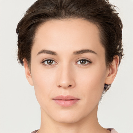 Neutral white young-adult female with short  brown hair and brown eyes