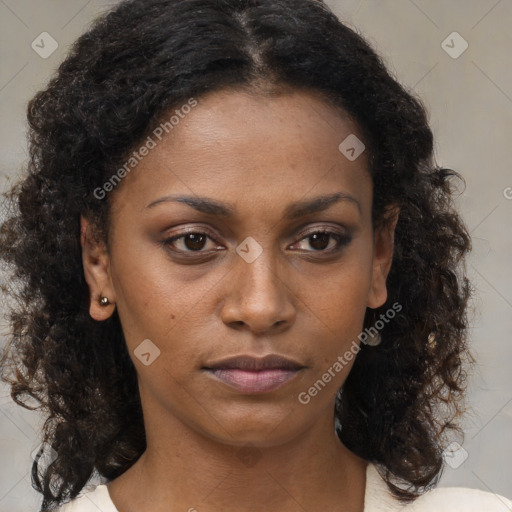 Neutral black young-adult female with medium  brown hair and brown eyes