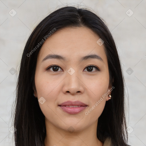 Joyful asian young-adult female with long  brown hair and brown eyes