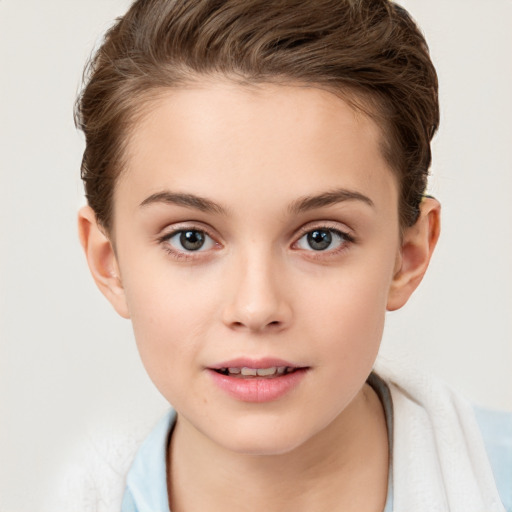 Joyful white child female with short  brown hair and brown eyes