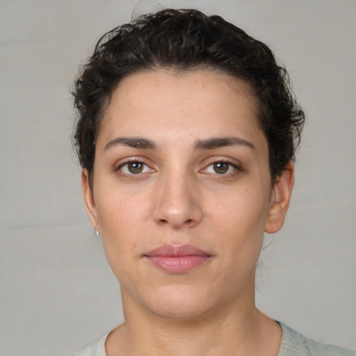 Neutral white young-adult female with short  brown hair and brown eyes