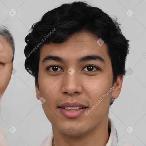 Joyful asian young-adult male with short  black hair and brown eyes