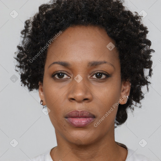 Neutral black young-adult female with short  black hair and brown eyes