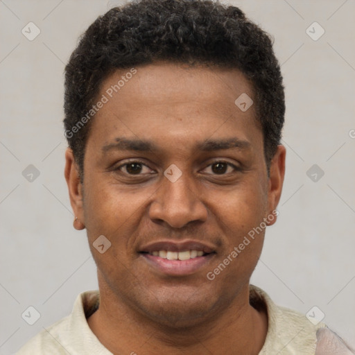Joyful latino young-adult male with short  brown hair and brown eyes