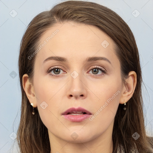 Neutral white young-adult female with long  brown hair and brown eyes