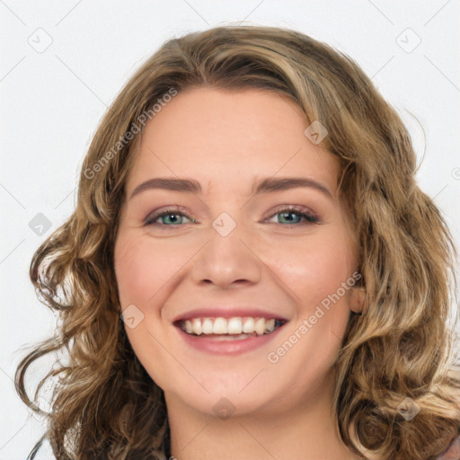 Joyful white young-adult female with long  brown hair and green eyes