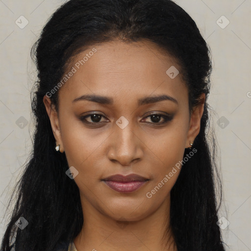 Joyful black young-adult female with long  black hair and brown eyes