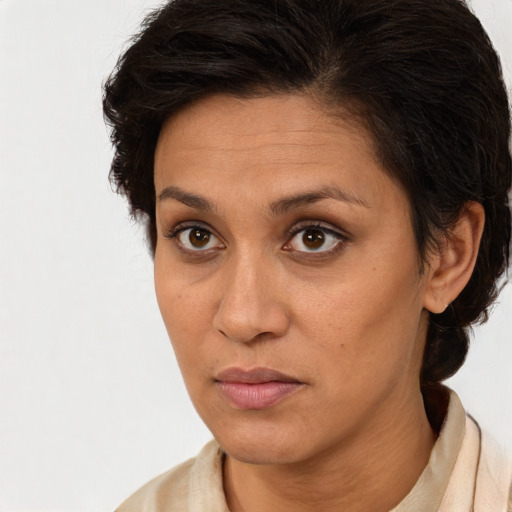 Neutral white adult female with short  brown hair and brown eyes