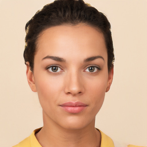 Neutral white young-adult female with short  black hair and brown eyes