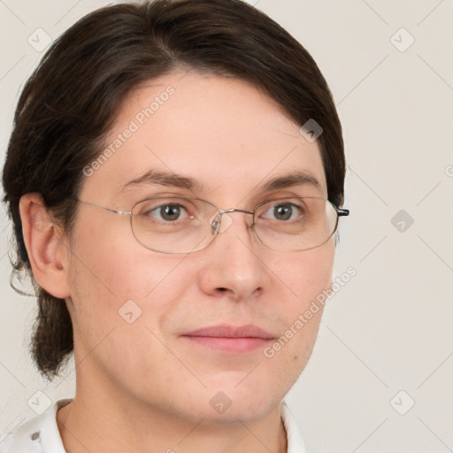 Joyful white adult female with short  brown hair and grey eyes