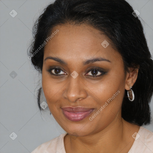 Joyful black young-adult female with medium  brown hair and brown eyes